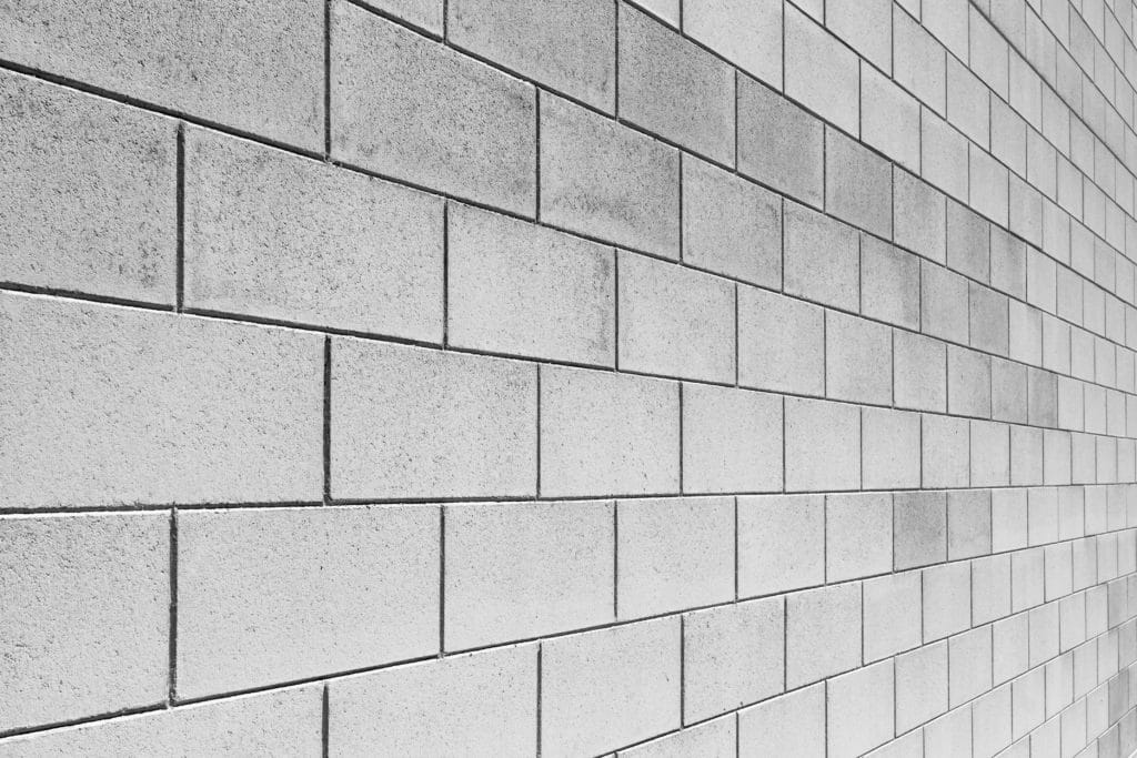 Textured gray brick wall pattern.