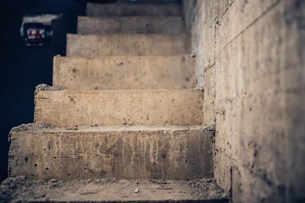 Close-up of weathered concrete stairs.